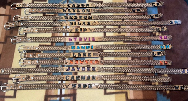 genuine leather hand tooled infant and toddler size belts with basketweave pattern and your choice of name, initials and design.
